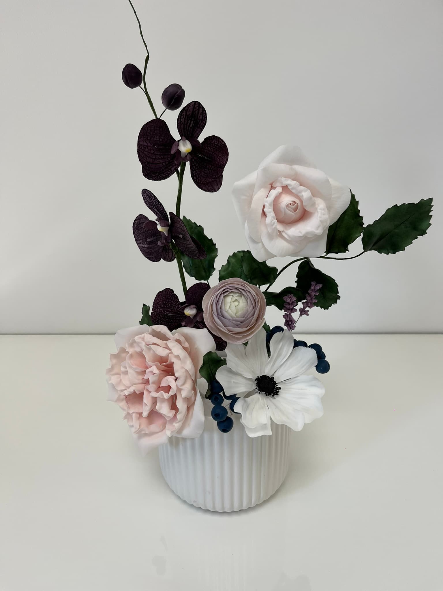 Bouquet de fleurs en sucre Bouquet de fleurs en sucre réalisées à la main : roses, orchidées, anémone, cake design Montauban
